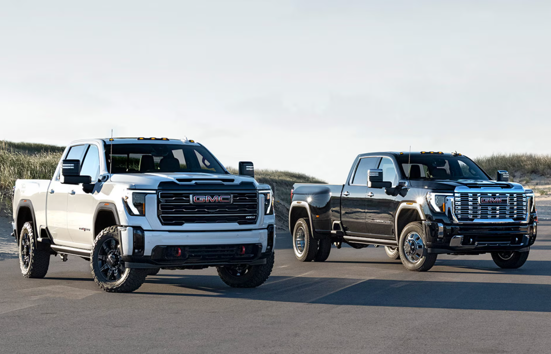 Two 2026 GMC Sierra HD trucks