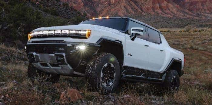 Hummer EV Pickup parked in grass