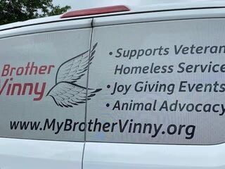 Side of a My Brother Vinny van showing its services list.